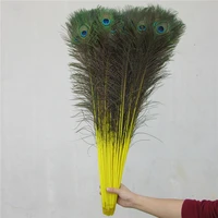 100pcslot quality peacock feathers for craft 70 80cm 28 32inch yellow feather diy supplies party carnival plumas