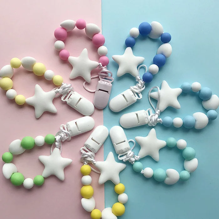 

Silicone Pacifier Clip Safety Eco-Friendly Newborn Baby Teething Toys infant Chain Food Grade Silicone Star Feeding Chain