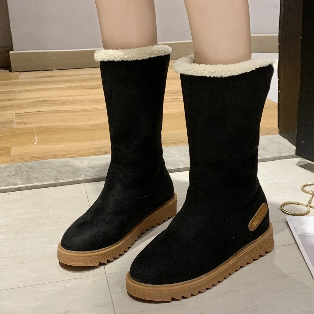 Женские сапоги до середины икры теплые зимние на плоской подошве однотонные без
