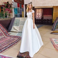 sodigne simple satin beach wedding dress elegant o neck cap sleeves lace applique floor length bridal gowns 2021