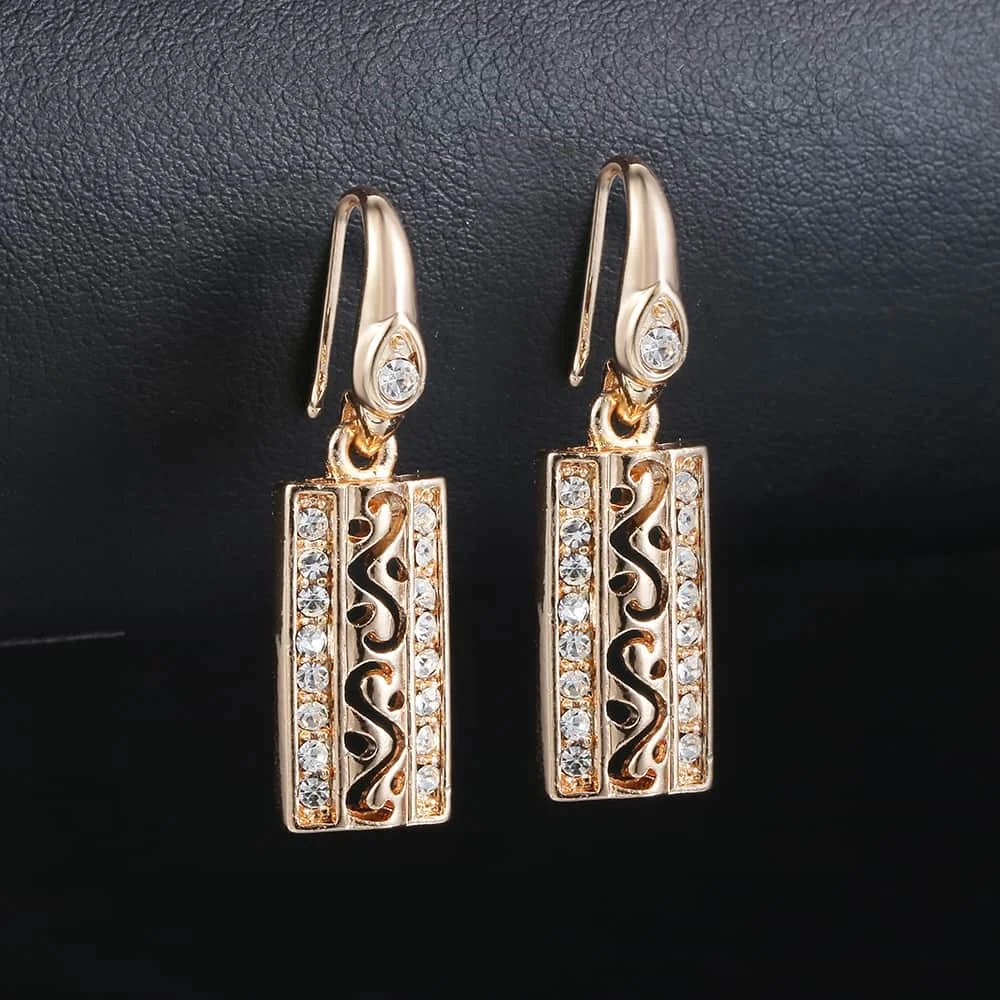 Женские серьги подвески из розового золота 585 пробы с вырезами и прозрачным