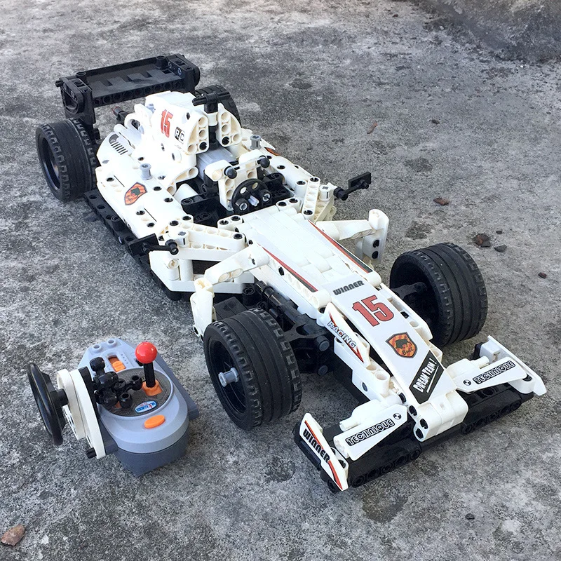 

Сборный конструктор автомобиль, механическая сборка, пульт дистанционного управления F1, гоночный мальчик подарк ко дню рождения в виде укр...