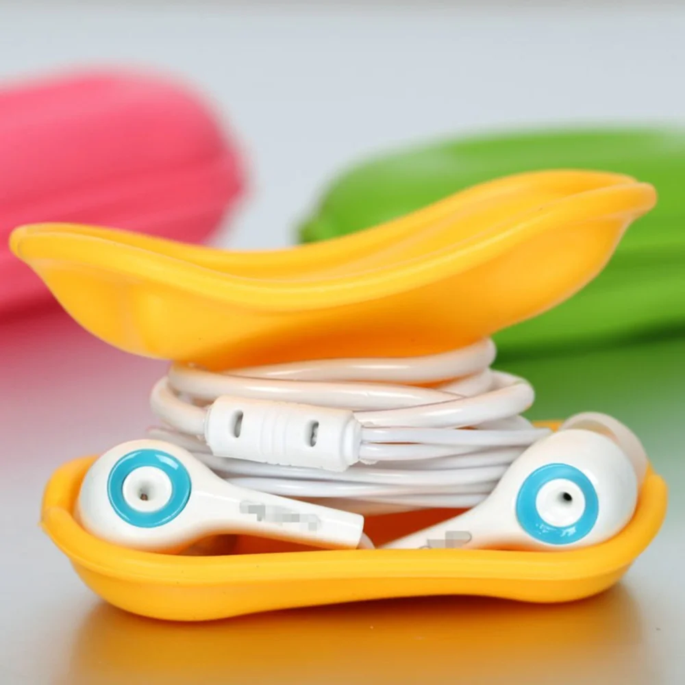 

4pcs Creative Peanut Shape Earphone Organizer Portable Earbuds Cord Winder USB Cable Protective Case (Random Color)