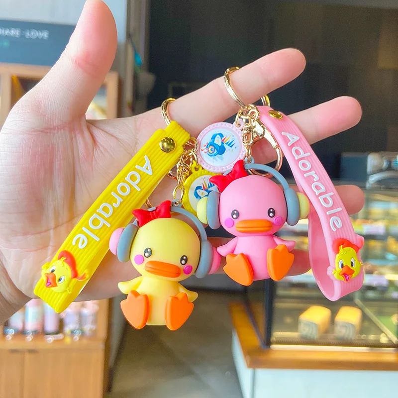 

New Creative Earphone Duck Key Chain Cartoon Cute Yellow Pink Duck Doll Bag Pendant Couple Car Key Chain Girls Key Ring Jewelry