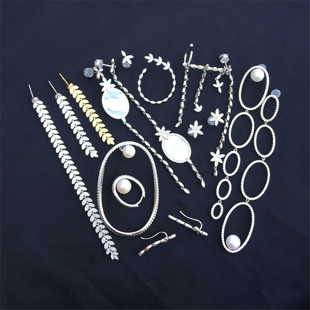 

cheny s925 sterling silver new leaves natural mother-of-pearl pearl earrings female small flower circle olive leaf earrings