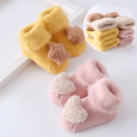 a pair of baby socks with fleece and thick childrens floor socks anti skid three dimensional dartoon cute baby warm socks