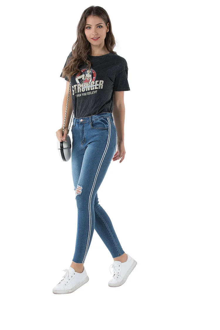 

2021 European and American jeans women spring autumn mid-waist torn elastic feet pencil pants trousers