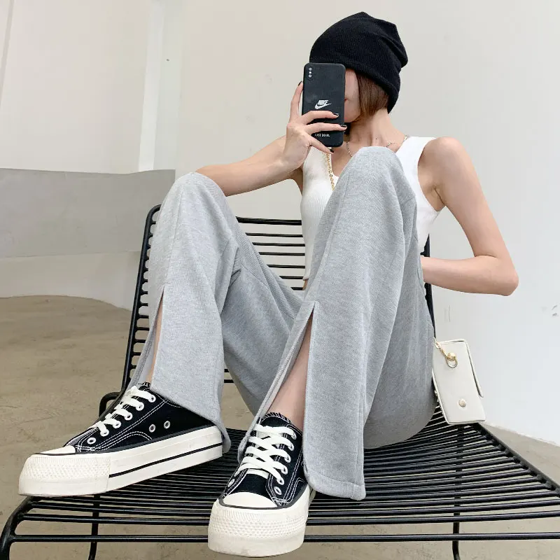 Женские широкие брюки с разрезом весенне осенние свободные прямые милые крутые