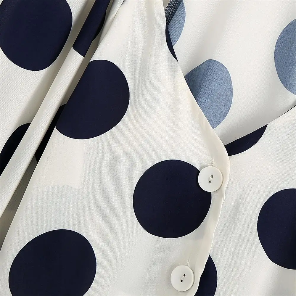 

2020 summer new loose and thin French V-neck bubble sleeve pleated polka dot commuter single-breasted drape shirt