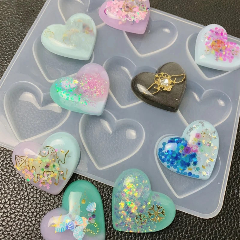 

3 Pcs Mold: 1 Pcs 9-Even Heart Shape Silicone Cake Mold & 2 Pcs Hexagonal Prism Epoxy Resin Silicone Molds With Pad