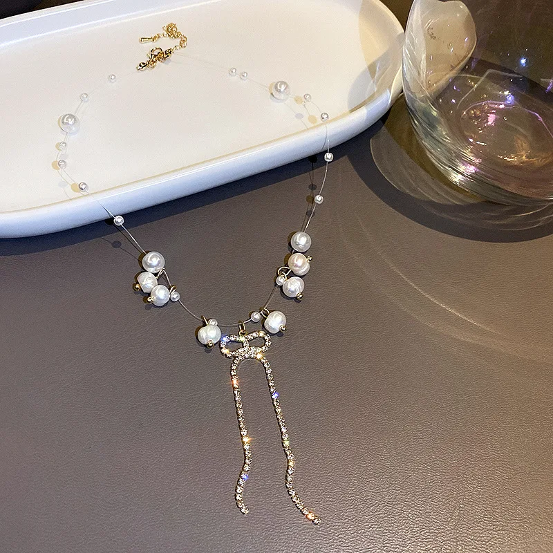 

French retro new necklace women's net red neck chain Mori pearl bow collarbone chain short style choker choker chain