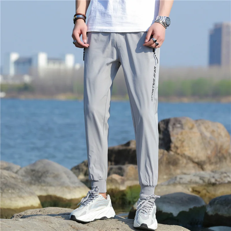 

2021 Spring Summer Casual Pants Nylon Men Pants Trousers and Straight Pants Loose Jogging Pants Men Casual Solid Color