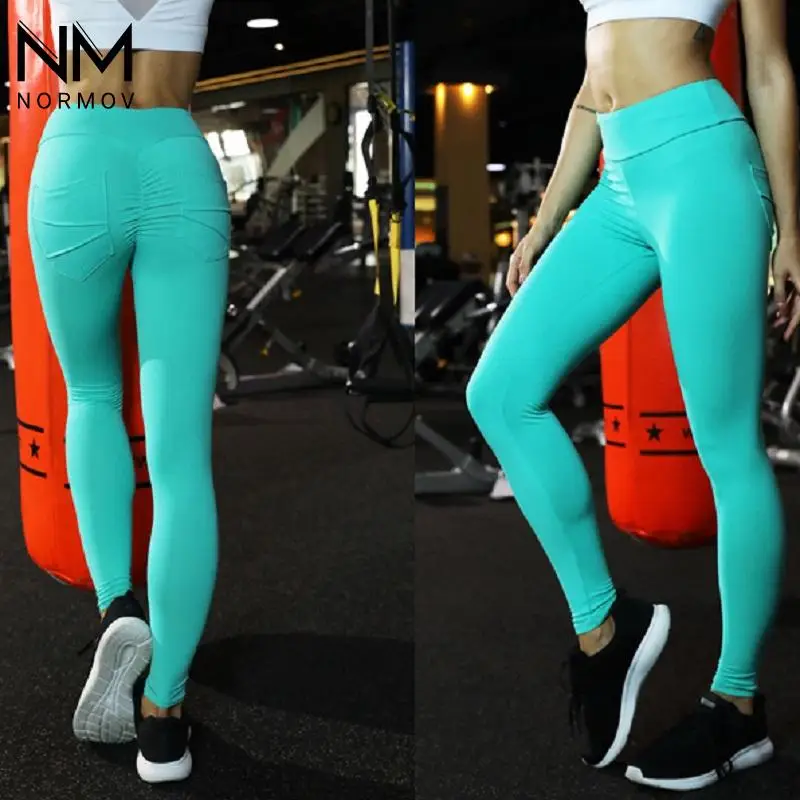 

NORMOV High Waist Breathable Leggings Women Sport Peach Hip Pockets Leggings Gym Workout Slim Stretchy Sexy Running Pants