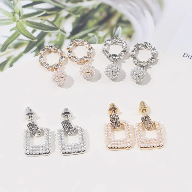 

KXR Summer Korean Artificial Pearl Ear Nail Temperament Contracted Hollow Round Ball Earring Web Celebrity Eardrop