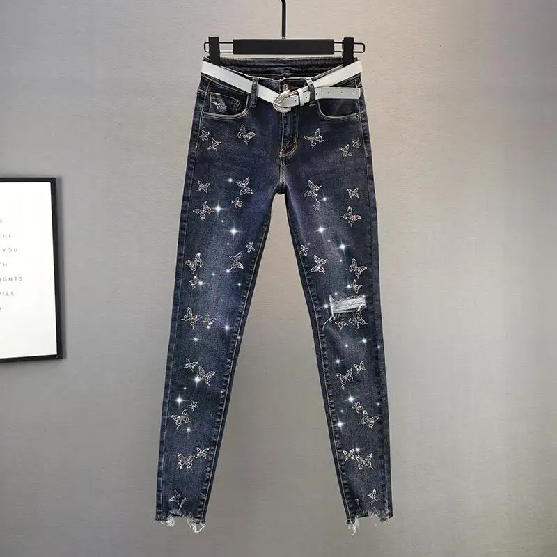 

New Womenâ€™s Korean Slim Fit Jeans Fashion Solid Color Ripped Hole Tassel Stretch Mid-waist Denim Pencil Long Pants Trousers