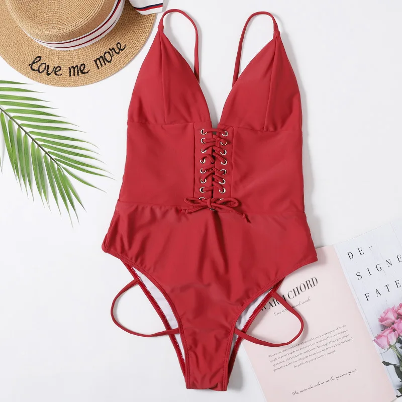 

Womens Sexy One-piece Bikini Fashion Solid Color or Printed Bandage Backless Suspender Swimsuit