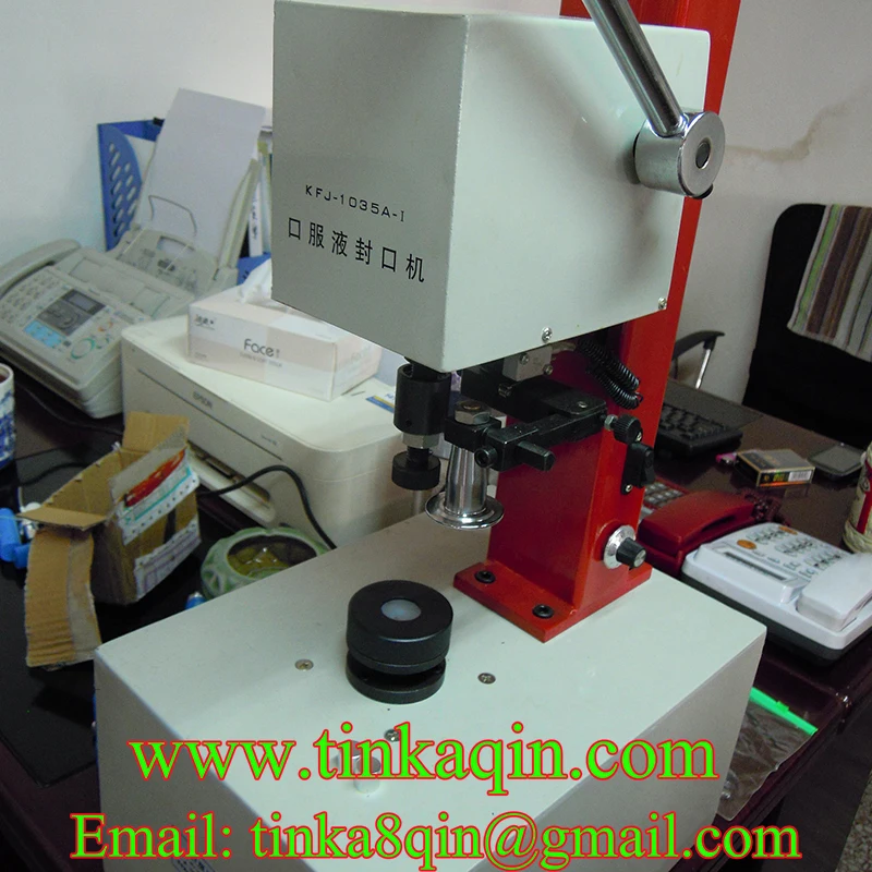 Фотоаппарат для герметизации жидкости в бутылках с металлическими крышками |