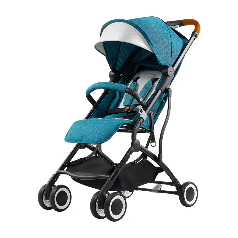 Детская тележка может легко сидеть в наклонном зонте автомобиль складной