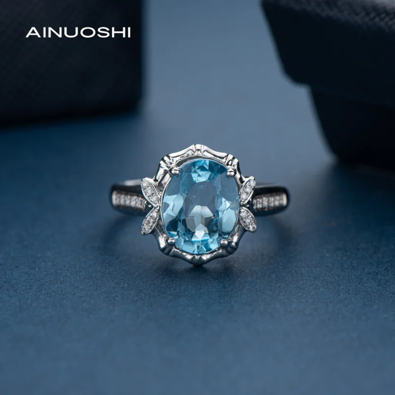 

AINUOSHI Vintage Oval Cut Gemstone Diamond Ring for Women 18K White Gold 3.21ct Blue Topaz 0.109ct Natural White Diamond Ring
