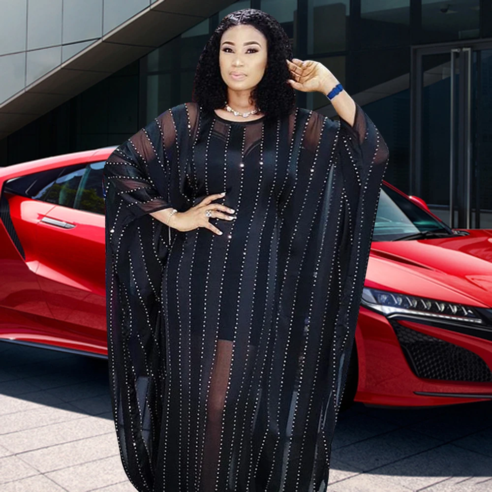 Женское платье в полоску с круглым вырезом и длинным рукавом летучая мышь