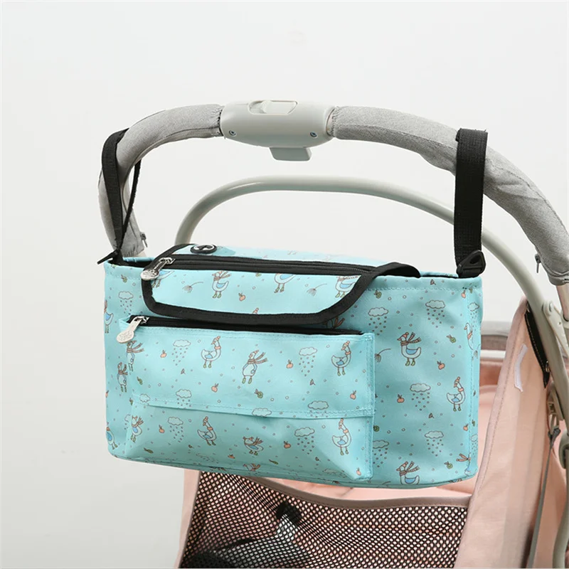 

Baby Stroller Bag Cartoon Print Infant Stroller Nursing Bag Hanging Large Capacity Baby Care Bags High Quality storage Pocket