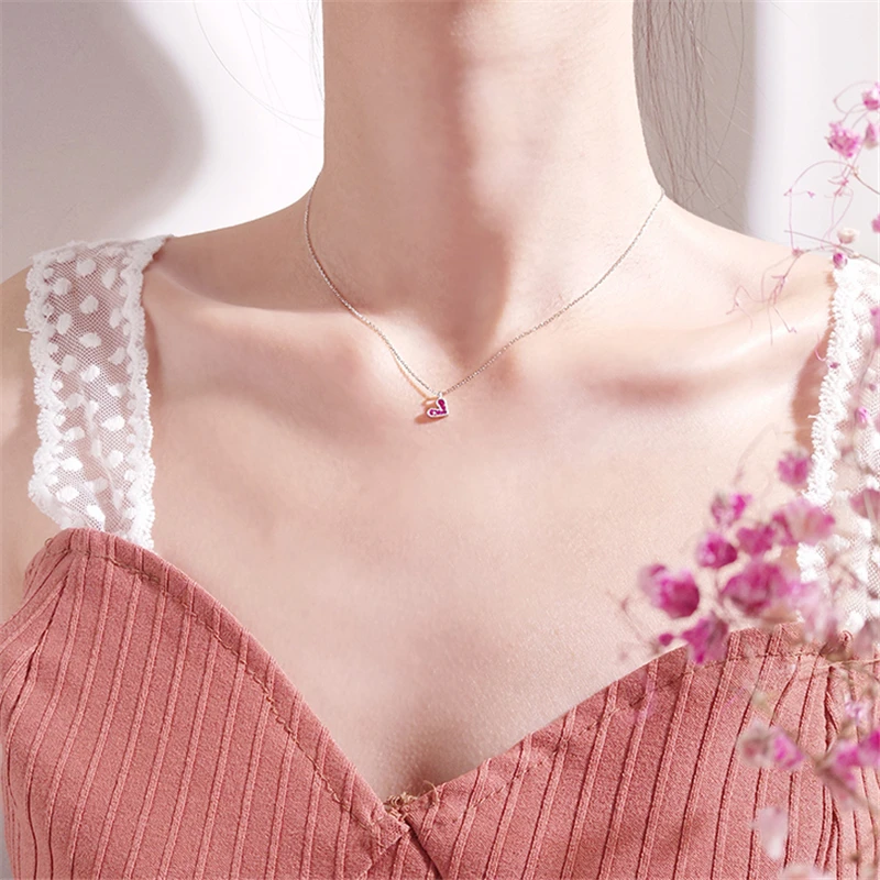 Ожерелье с подвеской в виде сердца из розового циркония серебристого цвета |