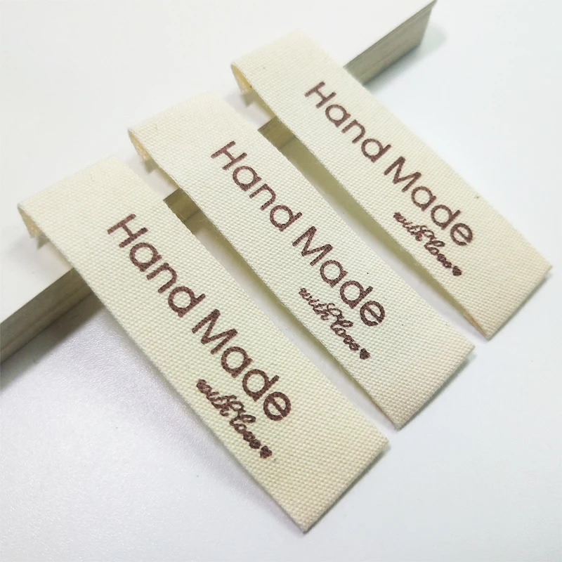 FreeShipping100PCsWhiteHandMadeWithLoveCottonWovenLabelsDIYAccessorySewingGrosgrainClothingLabel|Этикетки для одежды| |
