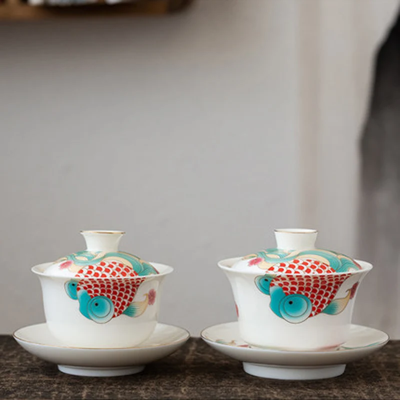 

Китайский чайный набор Gaiwan, кунг-фу, антиожоговый белый керамический фарфоровый мультяшный чехол для чая с рыбками, чаша с крышкой, чайная ч...