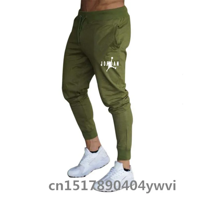 

2021 New jogging sports pants men's casual pants gym training pants men's spring and autumn pure fashion tight running Sweatpan