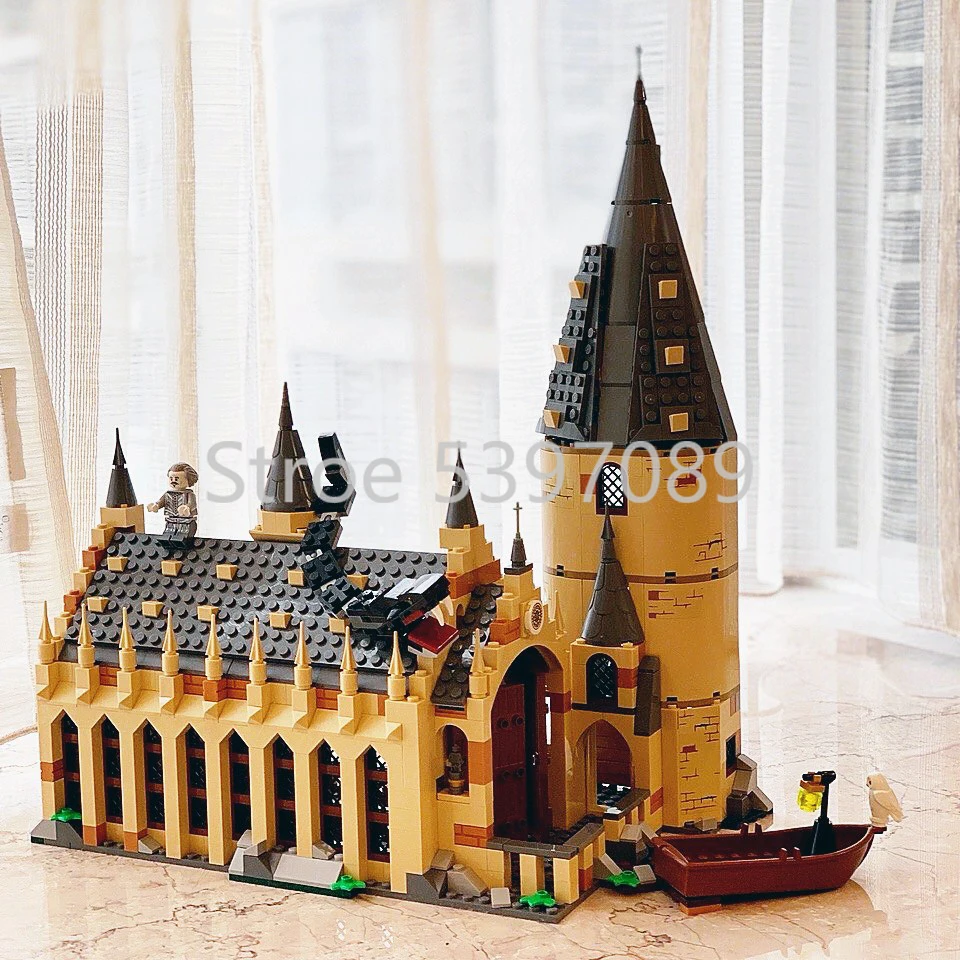 Строительные блоки в наличии модель 16052 Поттера Magic World Movie Hog warts Great Hall 878 шт.