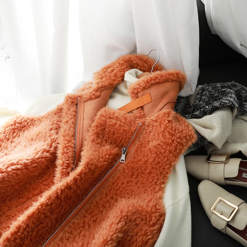 

2020 winter new lapel buckle loop stitching simple and versatile loose warm lamb hair particles fur one-piece waistcoat vest