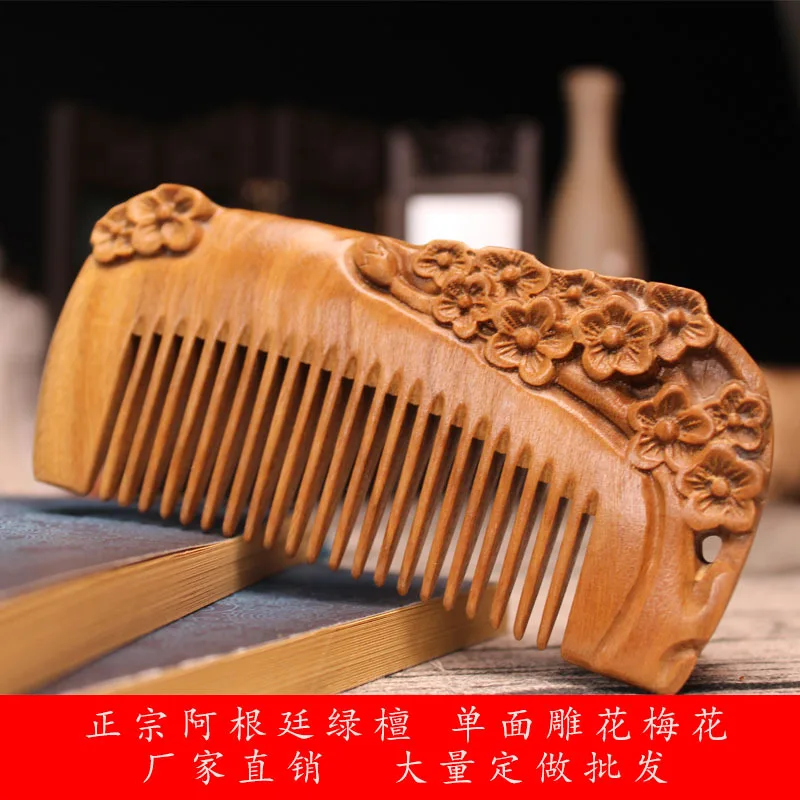 Factory direct sales of Argentine green sandalwood carving one-sided plum carving massage scalp