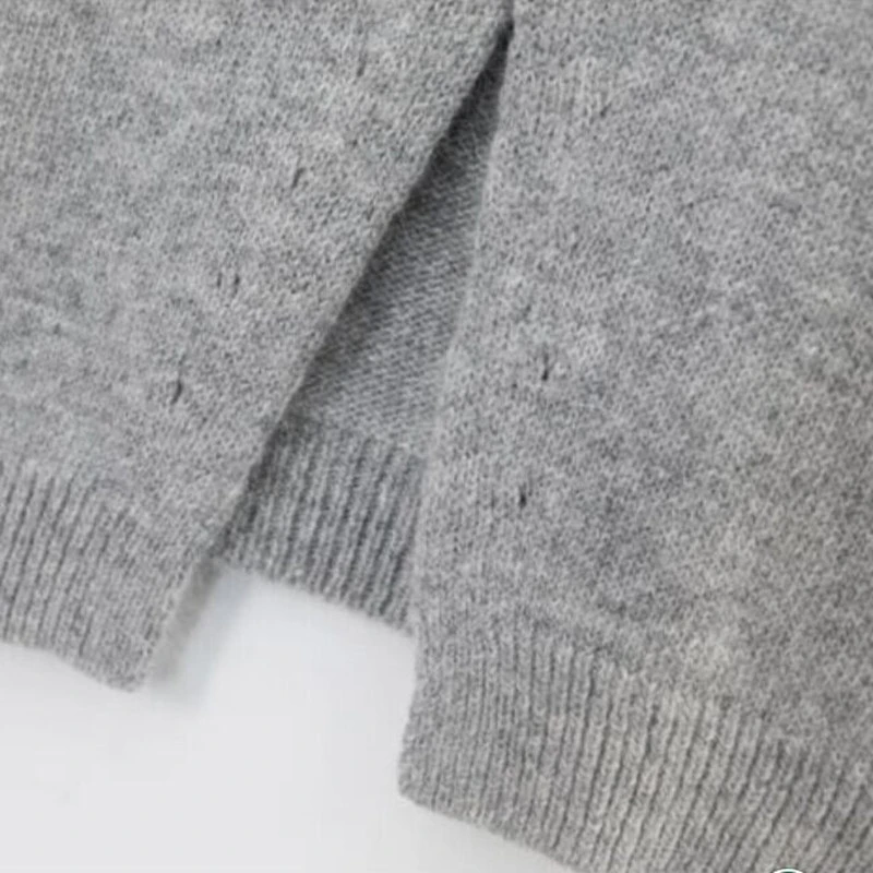 Повседневный серый вязаный пуловер без рукавов с перекрестным разрезом