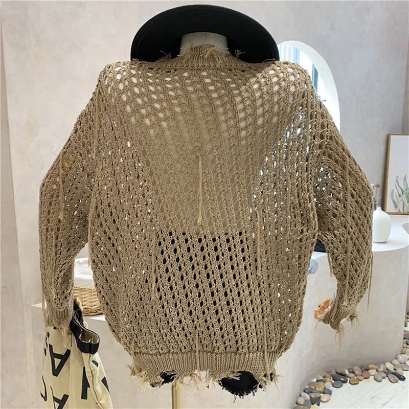 

Niche Design New Women's Clothing 2021 Fashion Design Sense Hollow Out Thin Long Sleeve Knit T-shirt Loose Sunscreen Blouse Top