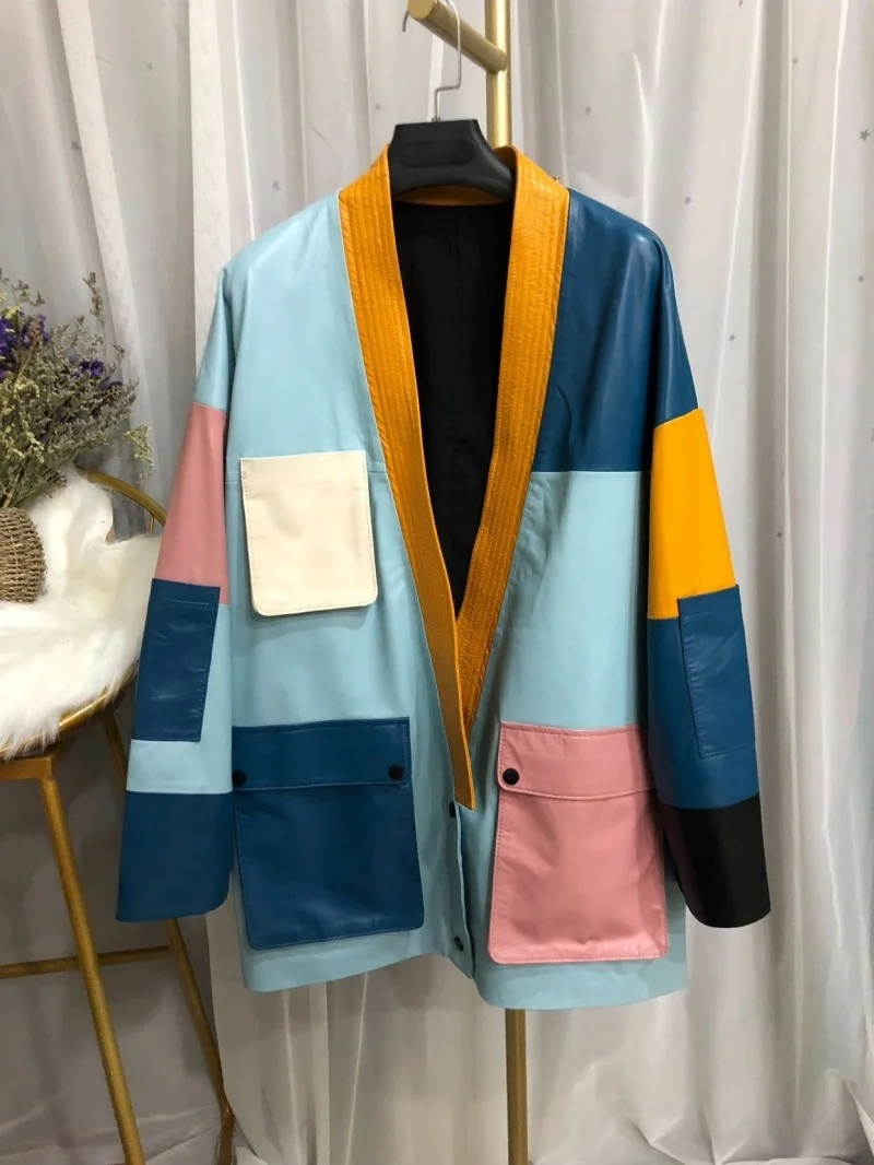 

Women's synthetic leather jacket, sheep's fur coat in mixed colours, with v, baggy and office cleavage