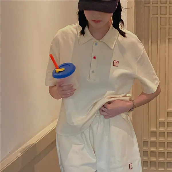 

Summer 2021 New Polo Collar Design Sense Sports Loose Short-sleeved T-shirt + Short Pants Two-piece Suit