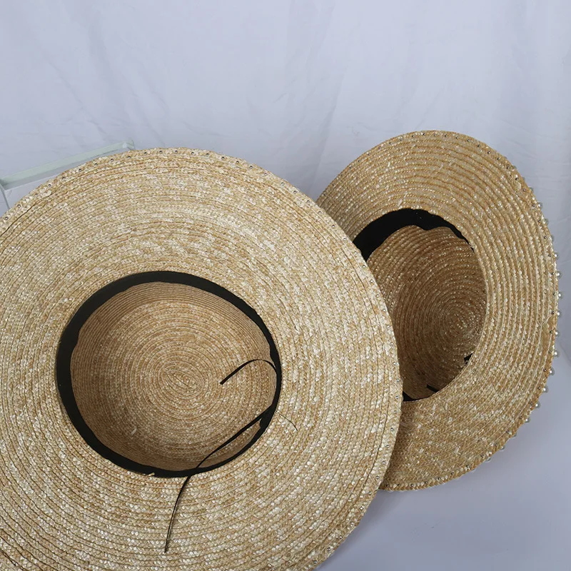 

Straw hat female summer pearl wheat straw big brimmed hat seaside vacation beach hat sun hat sun protection French sun hat