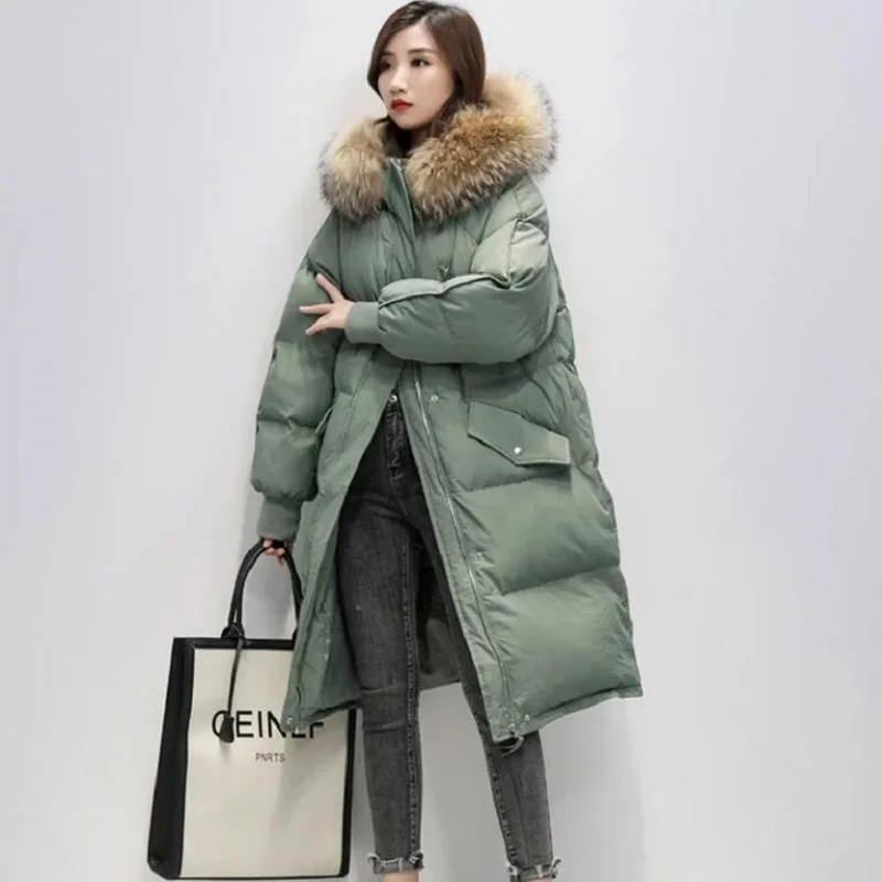 

Женская зимняя стеганая куртка в Корейском стиле с большим меховым воротником и капюшоном, длинные пуховые парки из хлопка, теплая свободна...