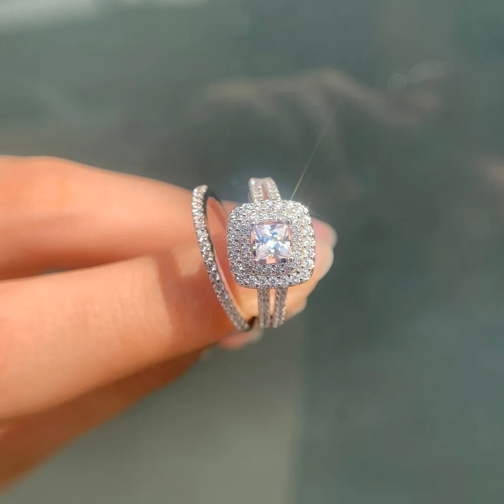 Wuziben 2 шт. 925 стерлингового серебра Свадебные Кольца для женщин 1.5Ct Принцесса Cut Белый Циркон Обручальное кольцо набор классических ювелирных изделий