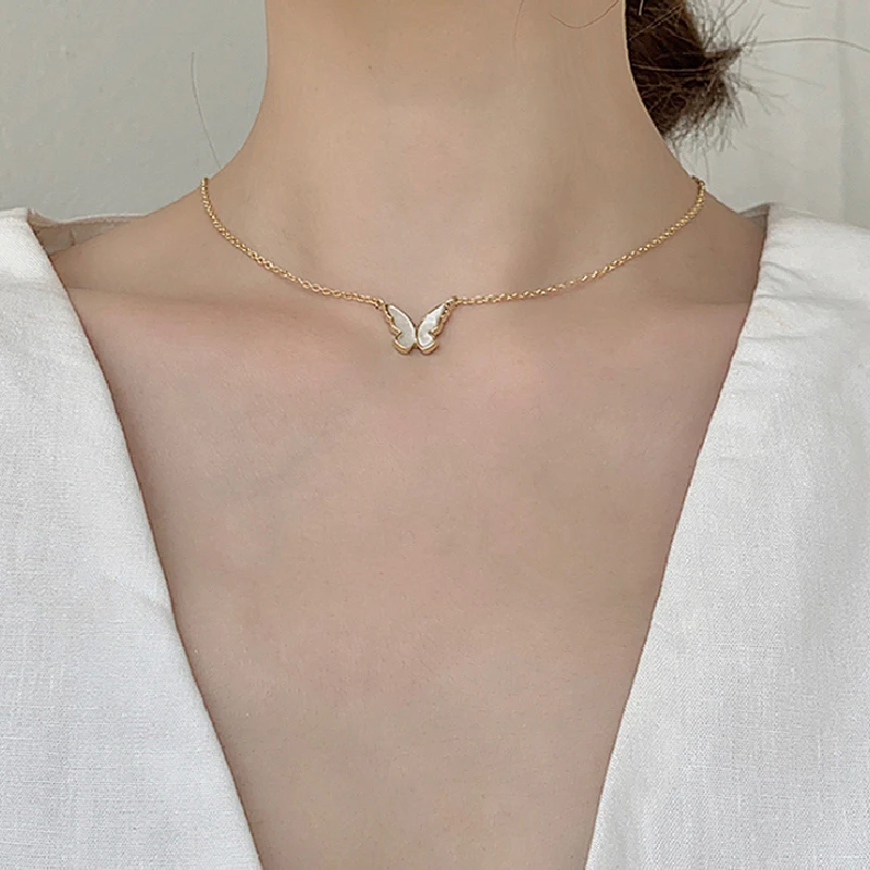 

Minority design white gold shell butterfly neck chain women's short hair clothing chain creative versatile light luxury clavicle