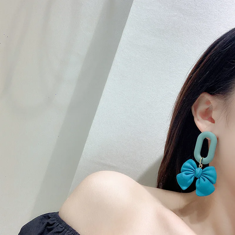 

Design sense temperament net red wild sweet earrings frosted bow acrylic earrings