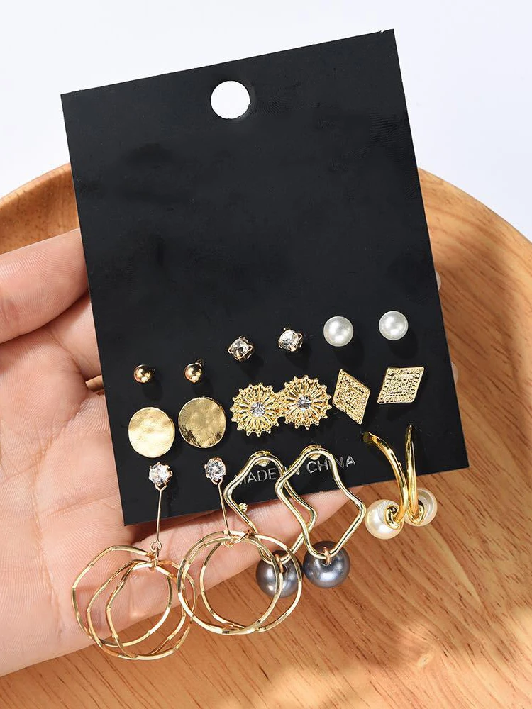 Сережки в виде жемчужных алмазов комбинация золотистого элегантного 9