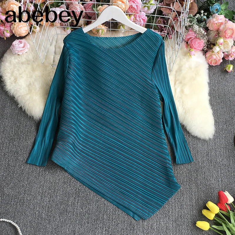 

2021 New Spring Autumn Temperament O-neck long sleeve T-Shirt irregular design high waist solid color short Pleated T-Shirt Top