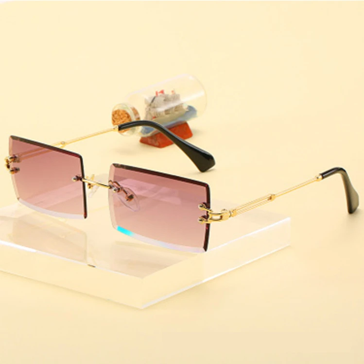 

2020 Trendy Men Women Summer Rimless Sunglasses Fashion Small Rectangle Sun Glasses Traveling Style UV400 Shades Eyewear