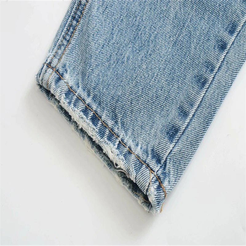 

high-waist jeans Featuring five-pocket design ripped detailing on the front and zip fly and metal top button fastenins
