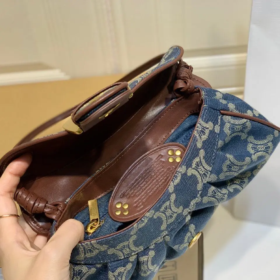 

2021 Summer Female Small Denim Denim Dumpling Bag European Retro Letter Pattern Pin Buckle Fold Baguette Bag