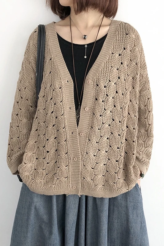 

Knitted cardigan women's spring and autumn loose large size thin section with a hollow long-sleeved top literary sweater jacket