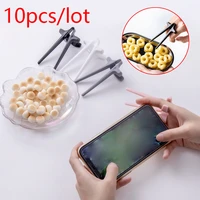 2022 creative snack chopsticks for play games lazy assistant clip snacks not dirty hand phone accessories kitchen tool