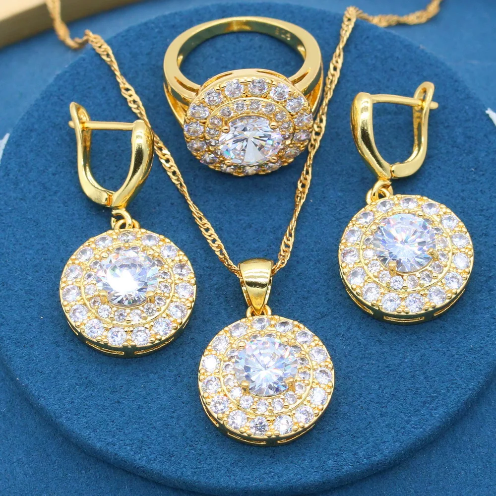 

Комплект из кольца, серёг и кольца, с камнями