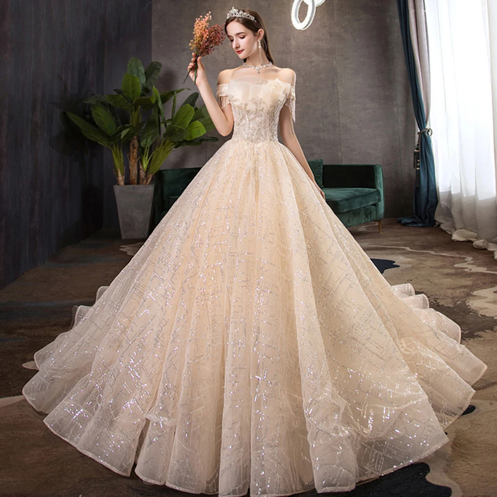 

Dioflyusa Romanti Luxury Lace Princess Wedding Dress For Women 2021 Champagne Boat Neck Sleeveless Elegant Tulle Bridal Gowns